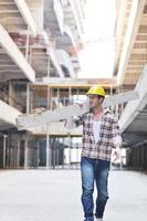 hard worker on construction site photo