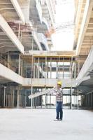 hard worker on construction site photo