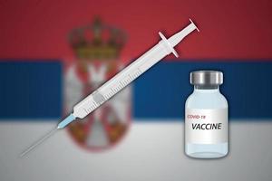 Syringe and vaccine vial on blur background with Serbia flag vector