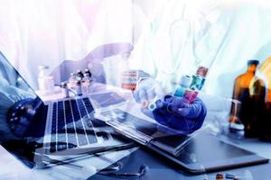Medicine doctor and stethoscope touching icon medical network connection with modern interface on digital tablet in hospital background. Medical technology network concept photo
