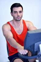 man running on the treadmill photo