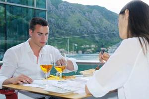 couple having lanch at beautiful restaurant photo