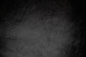 textura del antiguo muro de hormigón gris para fondo oscuro foto