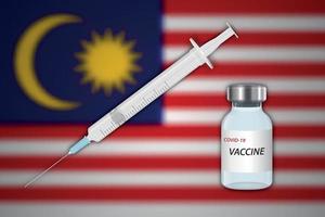 Syringe and vaccine vial on blur background with Malaysia flag vector