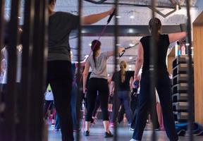 sporty women exercising with a rubber bands photo