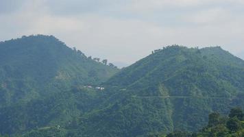 smoky image of uttarakhands green hills. photo