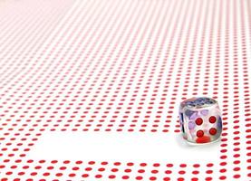 empty space for write and gambling dice on red dotted background photo