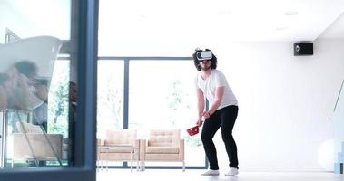 man using VR-headset glasses of virtual reality photo