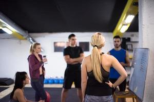 athletes getting instructions from trainer photo