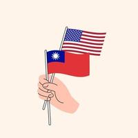 Cartoon Hand Holding United States And Taiwanese Flags. US Taiwan Relationships. Concept of Diplomacy, Politics And Democratic Negotiations. Flat Design Isolated Vector