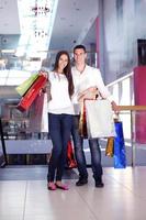 happy young couple in shopping photo