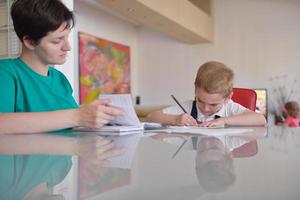 Boy doing homework photo