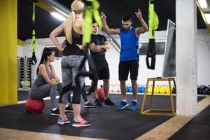 athletes getting instructions from trainer photo