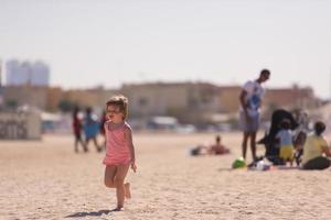 little cute girl at beach photo