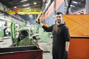 Greece, 2022 - industry workers people in factory photo