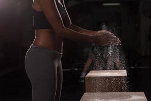 black woman preparing for climbing workout photo