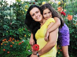 happy mom and daughter outdoor photo