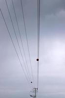 Electrical wires carrying high voltage current. photo