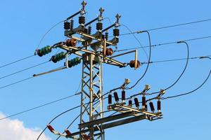 Electrical wires carrying high voltage current. photo