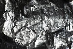 Foil texture. Wrinkled foil of ribbed color. photo