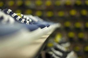 Shoes in the store. Sale of shoes in a clothing store. photo