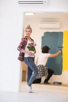 happy young couple doing home renovations photo