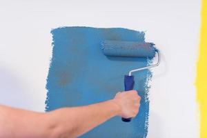 Decorator's hand painting wall photo