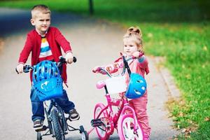 boy and girl with bicycle photo