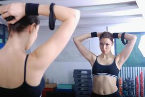 pretty girl in fitness studio photo