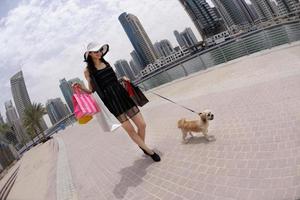 beautiful woman goes in shopping photo