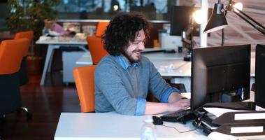businessman working using a computer in startup office photo