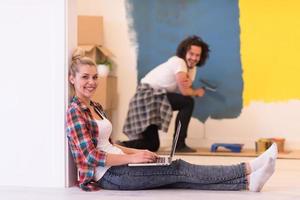 Happy couple doing home renovations photo