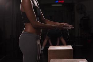 black woman preparing for climbing workout photo