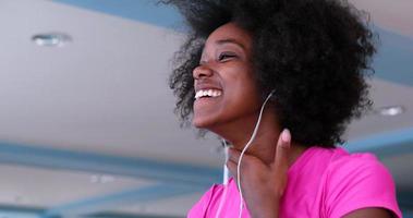 portrait of young black woman in gym photo