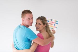 couple looking at color samples at home photo