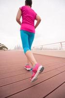 woman running on the promenade photo