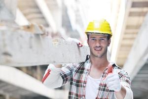 hard worker on construction site photo