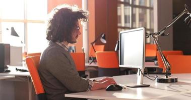 businessman working using a computer in startup office photo