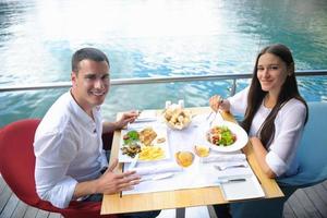 couple having lanch at beautiful restaurant photo