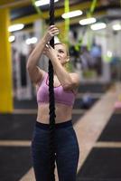 woman doing rope climbing photo