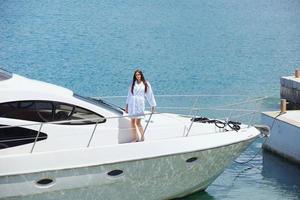 young couple on yacht photo