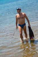 fisherman preparing for underwater fishing photo