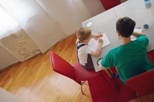 Boy doing homework photo