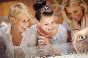 girls shopping in jewelry store photo