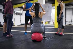 athletes getting instructions from trainer photo