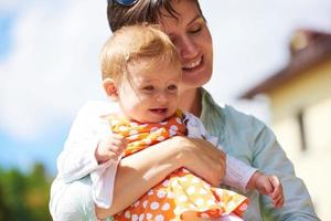 mother and baby in park photo