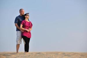 couple enjoying the sunset photo