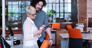 Business People Working With Tablet in office photo