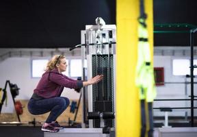 woman working out  jumping on fit box photo