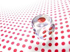 gambling dice on red dotted background photo